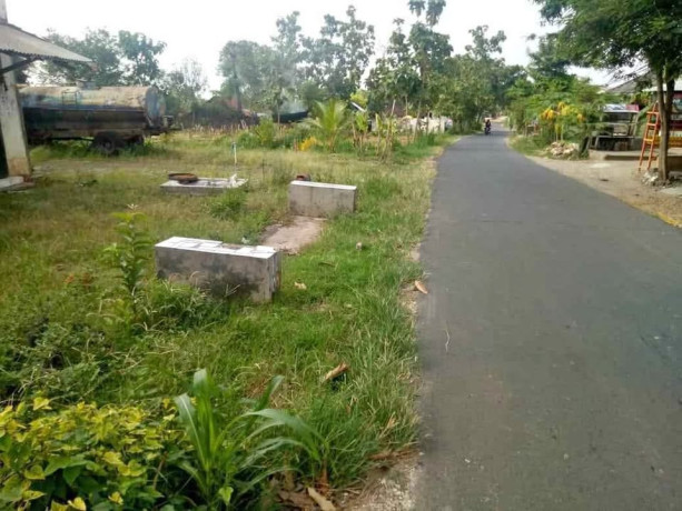 beli-tanah-bonus-rumah-lokasi-strategis-pinggir-jalan-raya-big-1